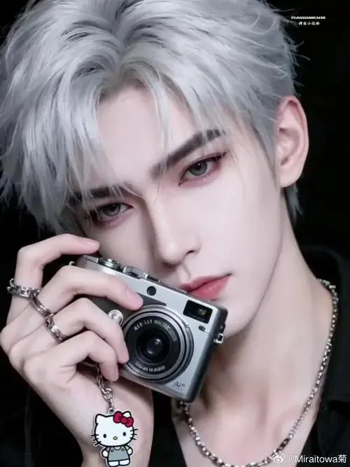 44 Hình chàng trai trong studio nền xám, áo ba lỗ tối ôm gọn bờ vai và gương mặt hướng thẳng máy, bố cục tối giản giúp thần thái lên rõ, mang cảm giác rắn rỏi, cá tính và có sức hút rất tự nhiên