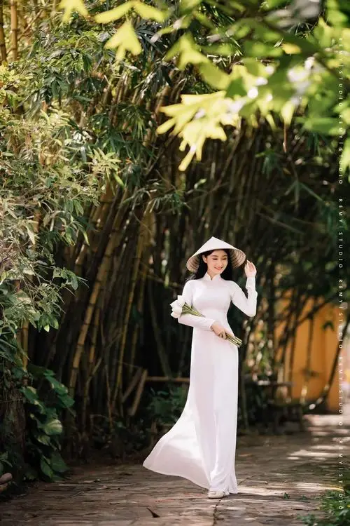 Cách Tạo Dáng Chụp Ảnh Áo Dài ngoại cảnh với 93 kiểu dáng mềm mại dịu dàng duyên dáng